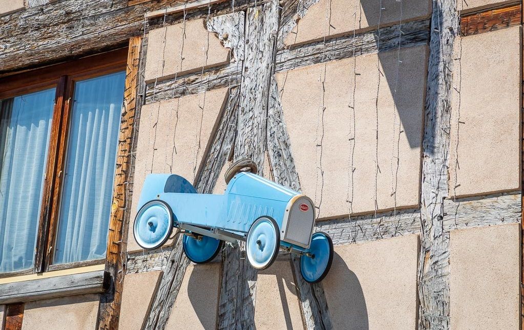 A-french-blue-Bugatti-car-shop-sign-Molsheim-Alsace-France