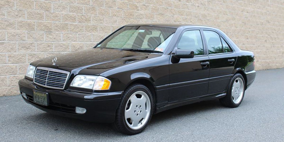 Black 1999 Mercedes Benz C43 AMG 