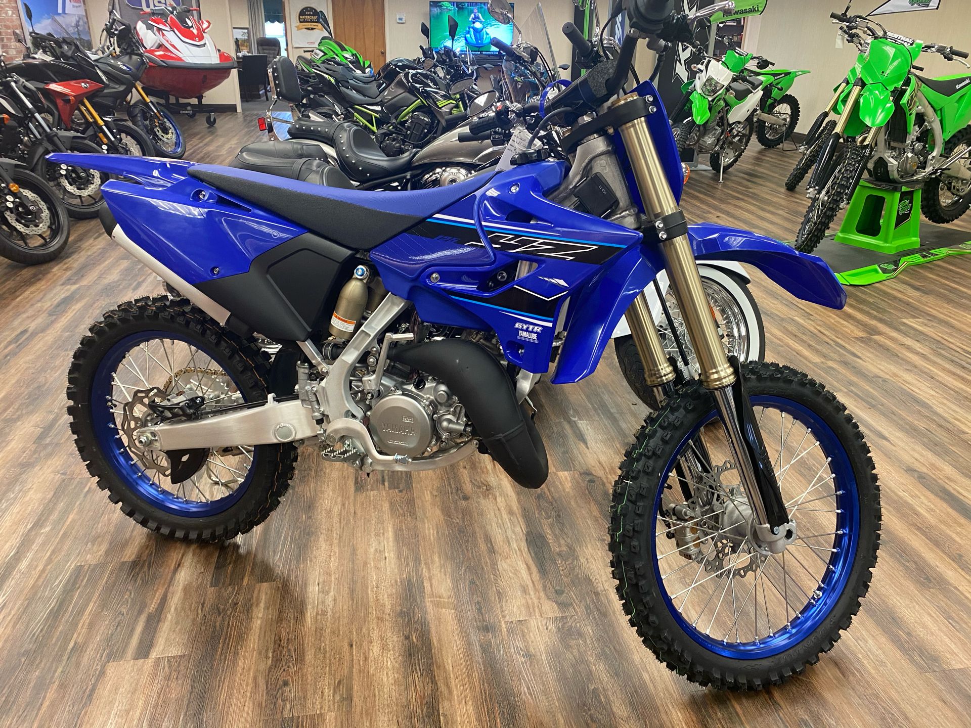 Blue Yamaha YZ125 in showroom