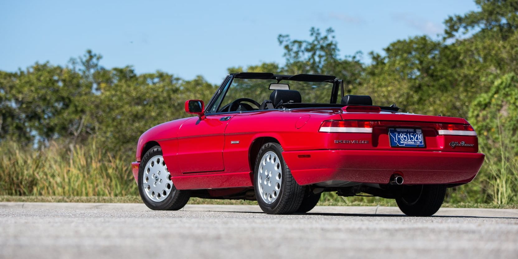 Alfa Romeo Spider S4 red sports car parked