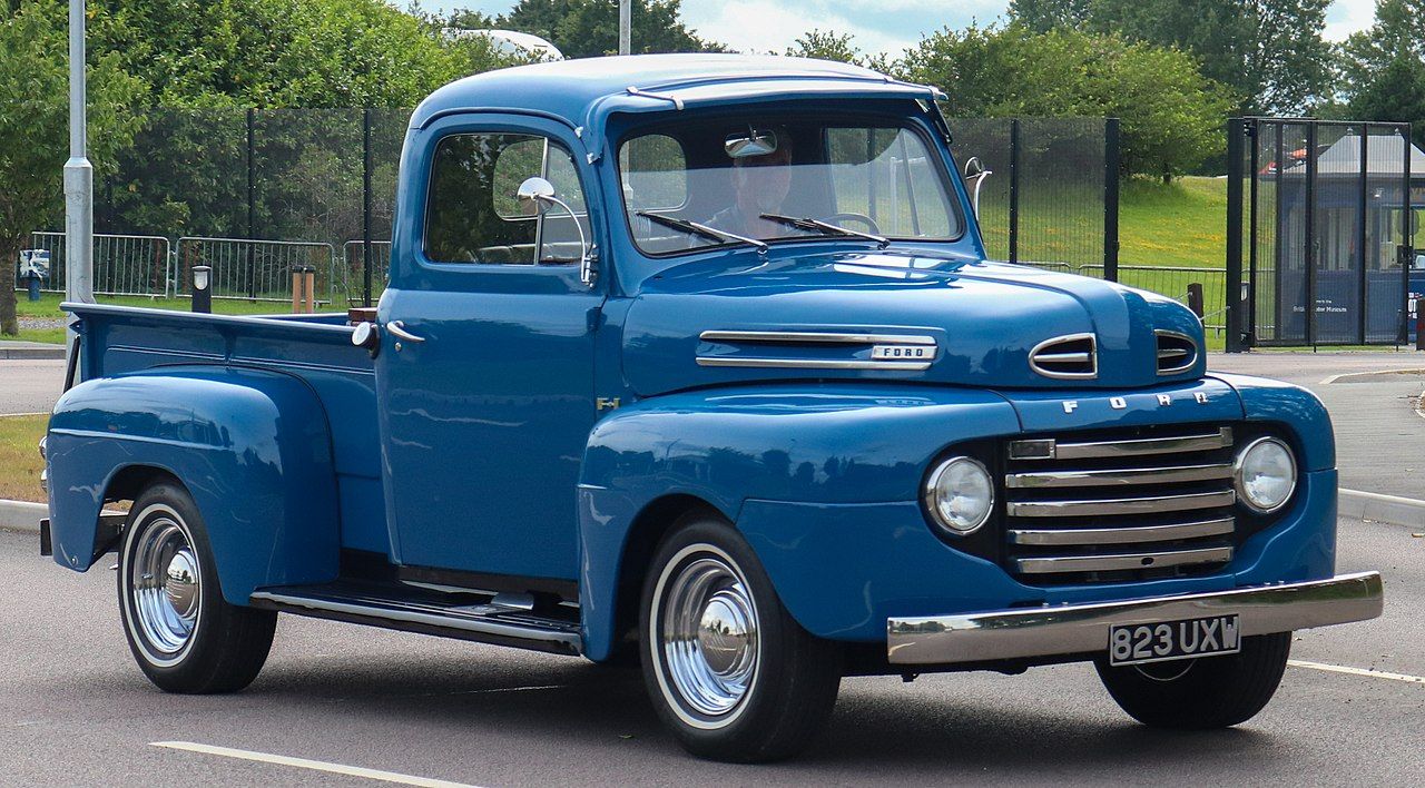 Blue 1949 Ford F-1 F-Series Pickup Truck Parked Outside