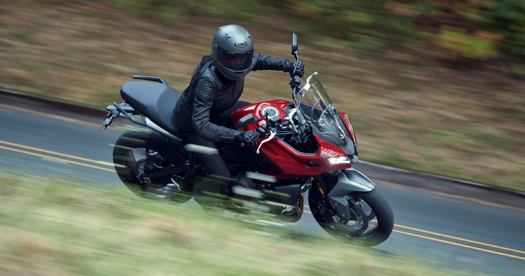 A rider out on a 2022 Triumph Tiger Sport 660.