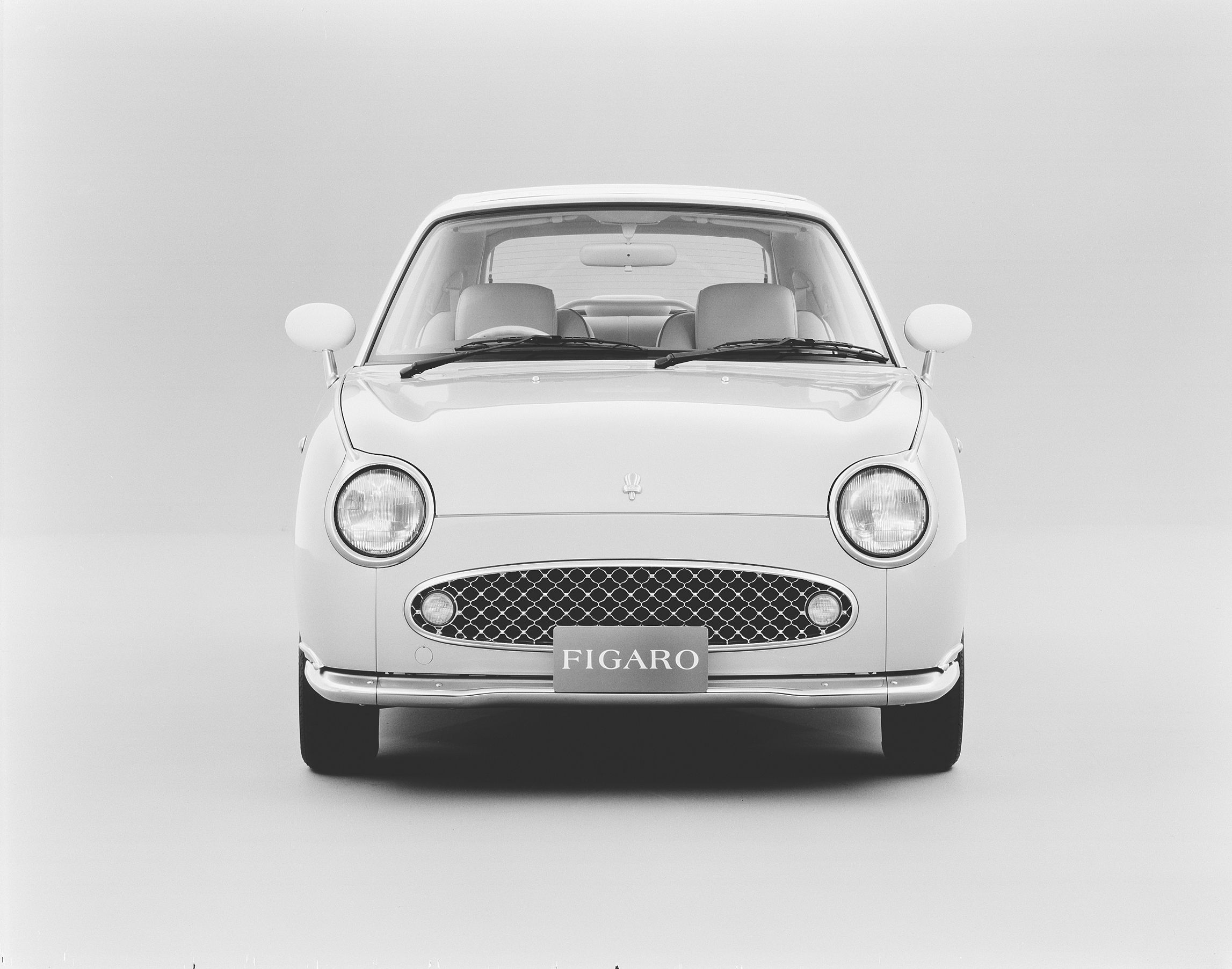 Nissan Figaro Front black and white