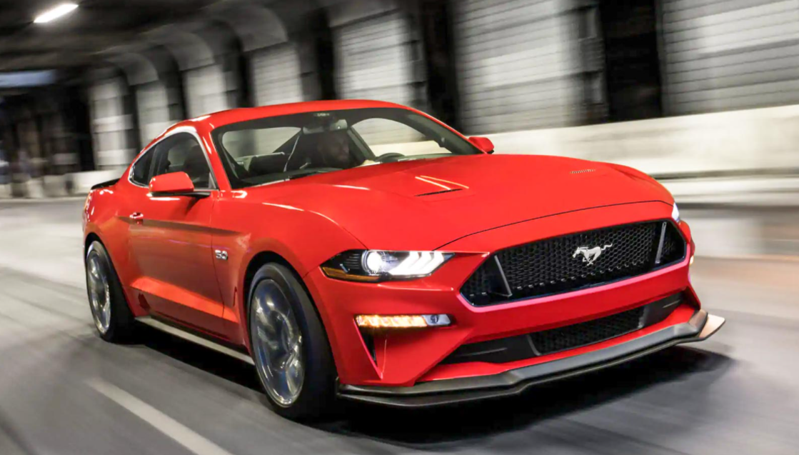 A Red Ford Mustang In Motion