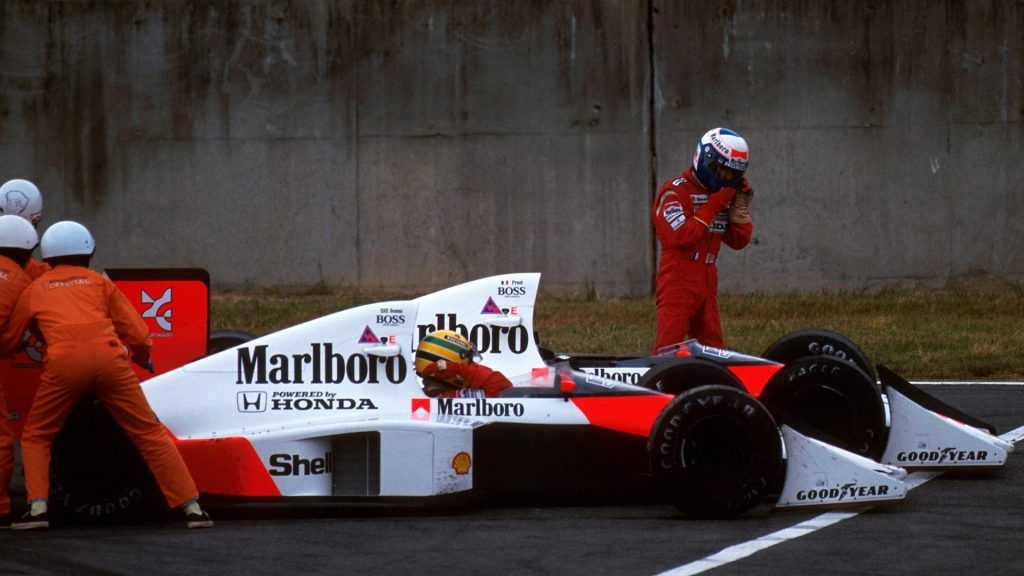 Alain Prost Moves Away From His Car After A Collision With Senna