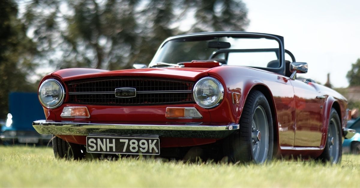 FEATURE PHOTO Red Triumph TR6 by pyntofmyld