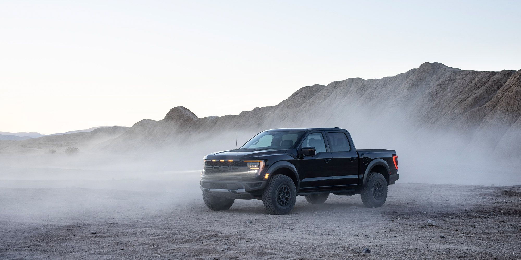 Front 3/4 view of a black F150 Raptor