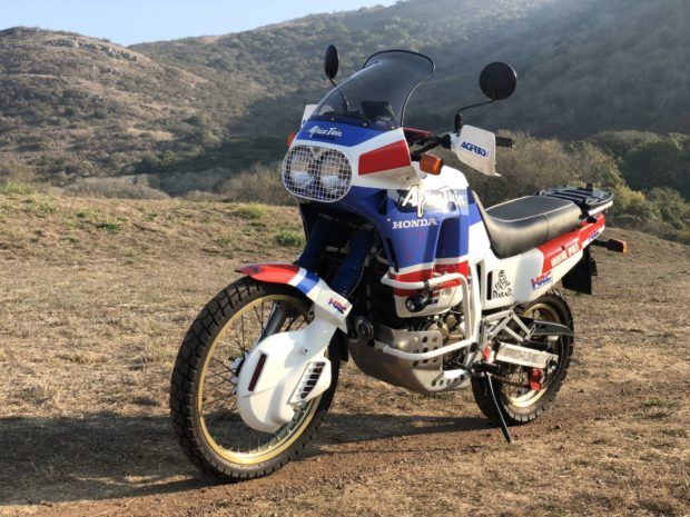 Honda XRV650 Africa Twin parked in the rough