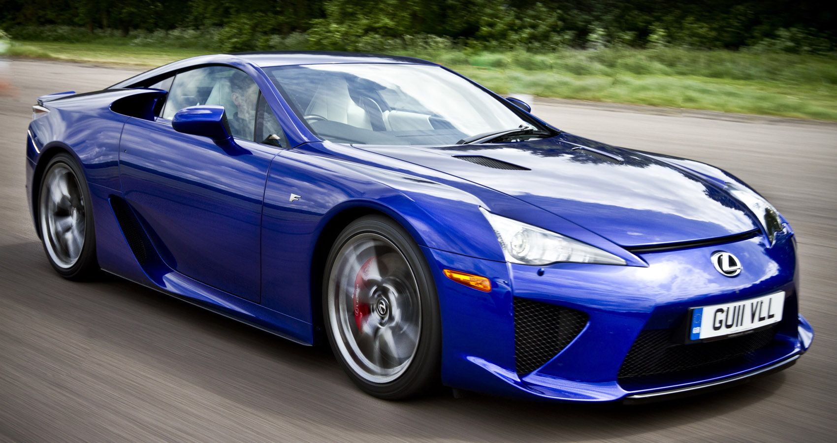 Front 3/4 view of a blue LFA on the move