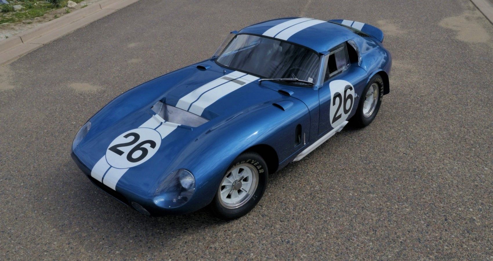 Blue 1965 Shelby Daytona Coupe Parked On The Road