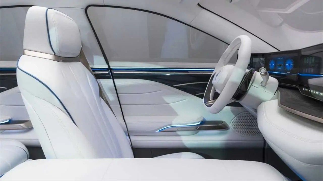 The Stylish White Interior Of The Pininfarina Foxconn Model E