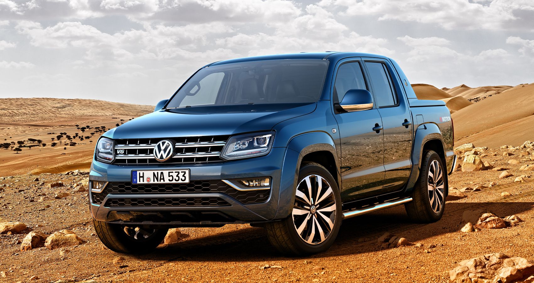 The front of a blue Amarok