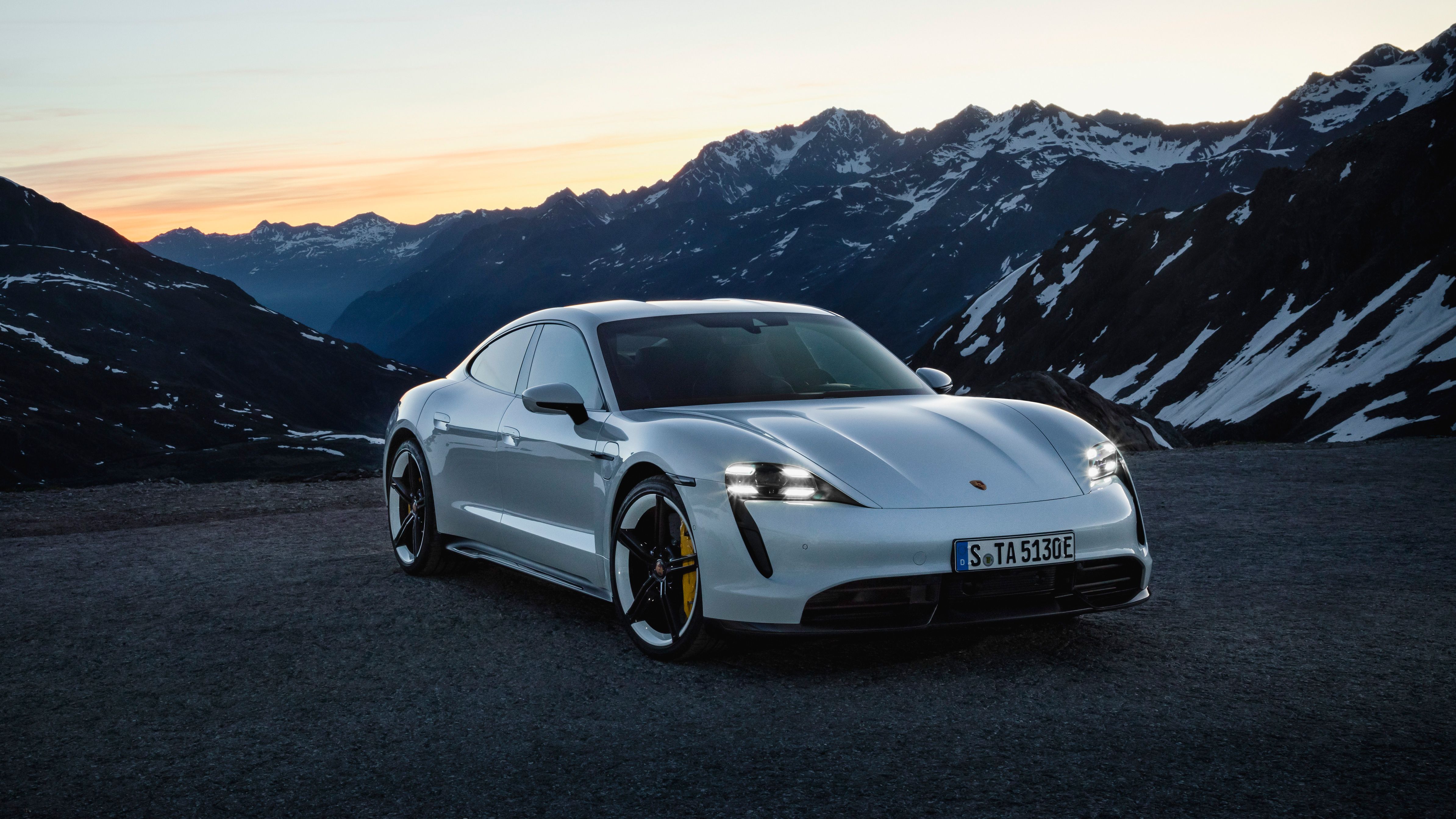 Porsche Taycan Front Quarter View With Mountain Backdrop