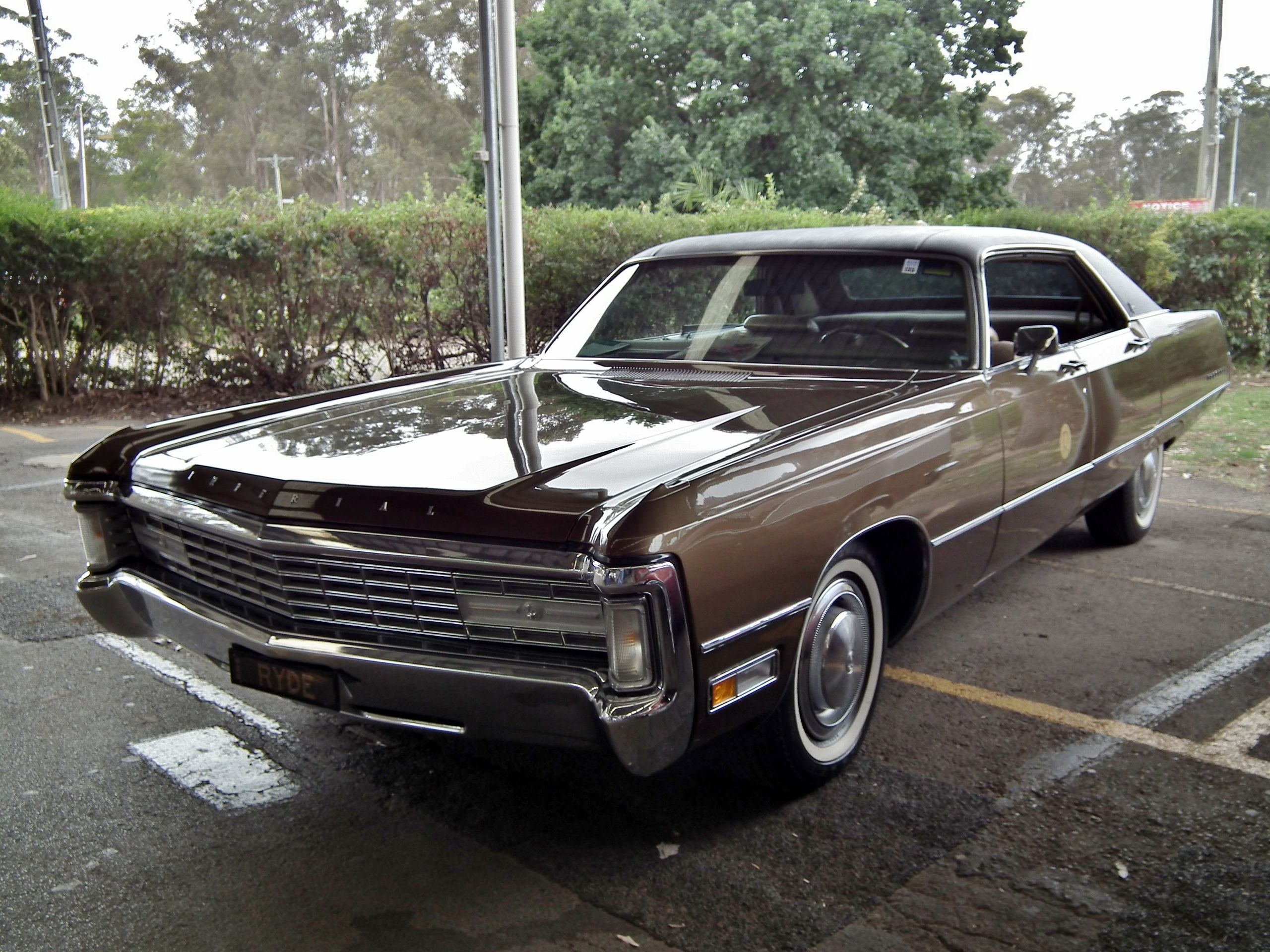 The Chrysler Imperial LeBaron Hardtop Sedan, side profile, metallic brown