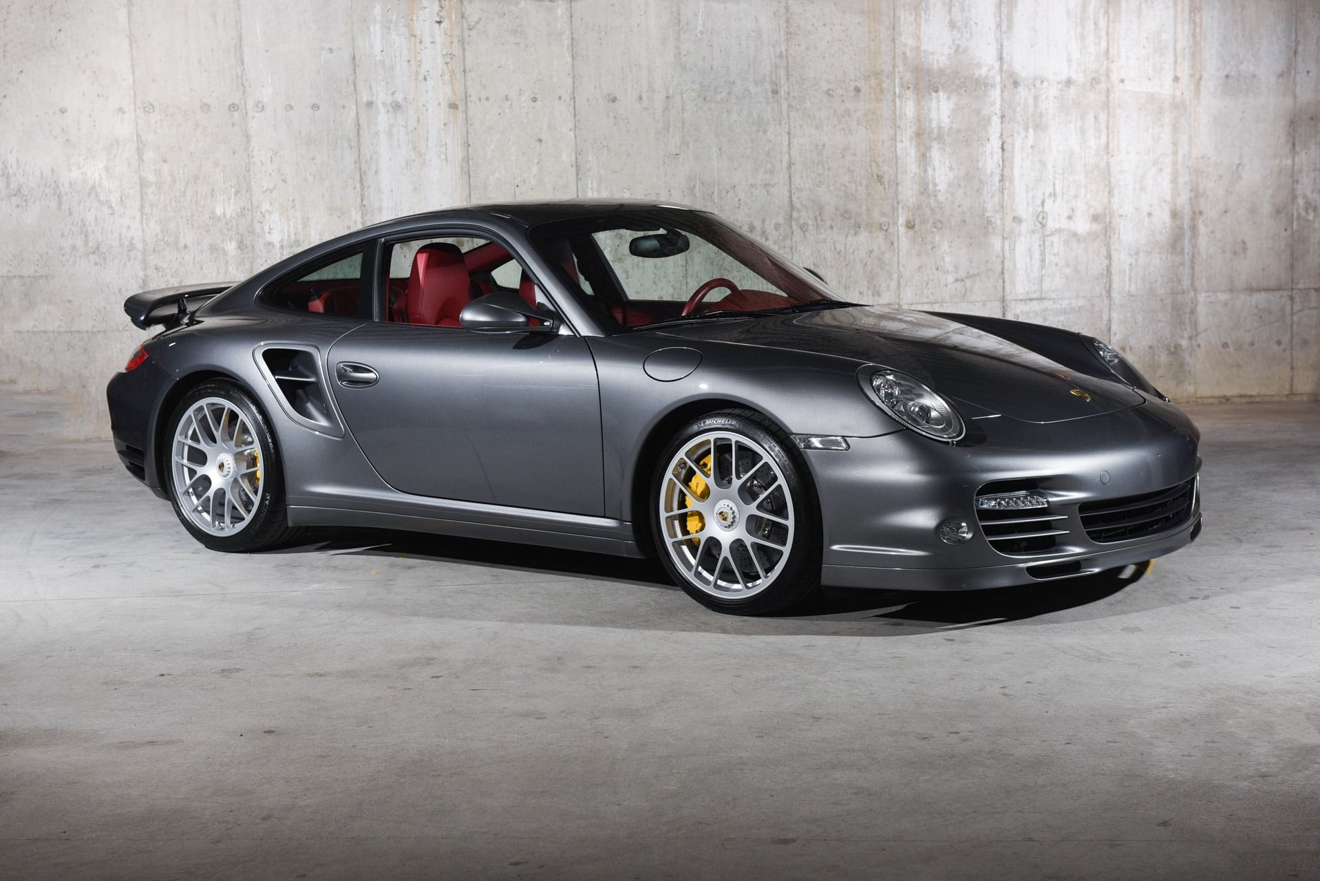the 2012 Porsche 997.2 911 Turbo at a parking