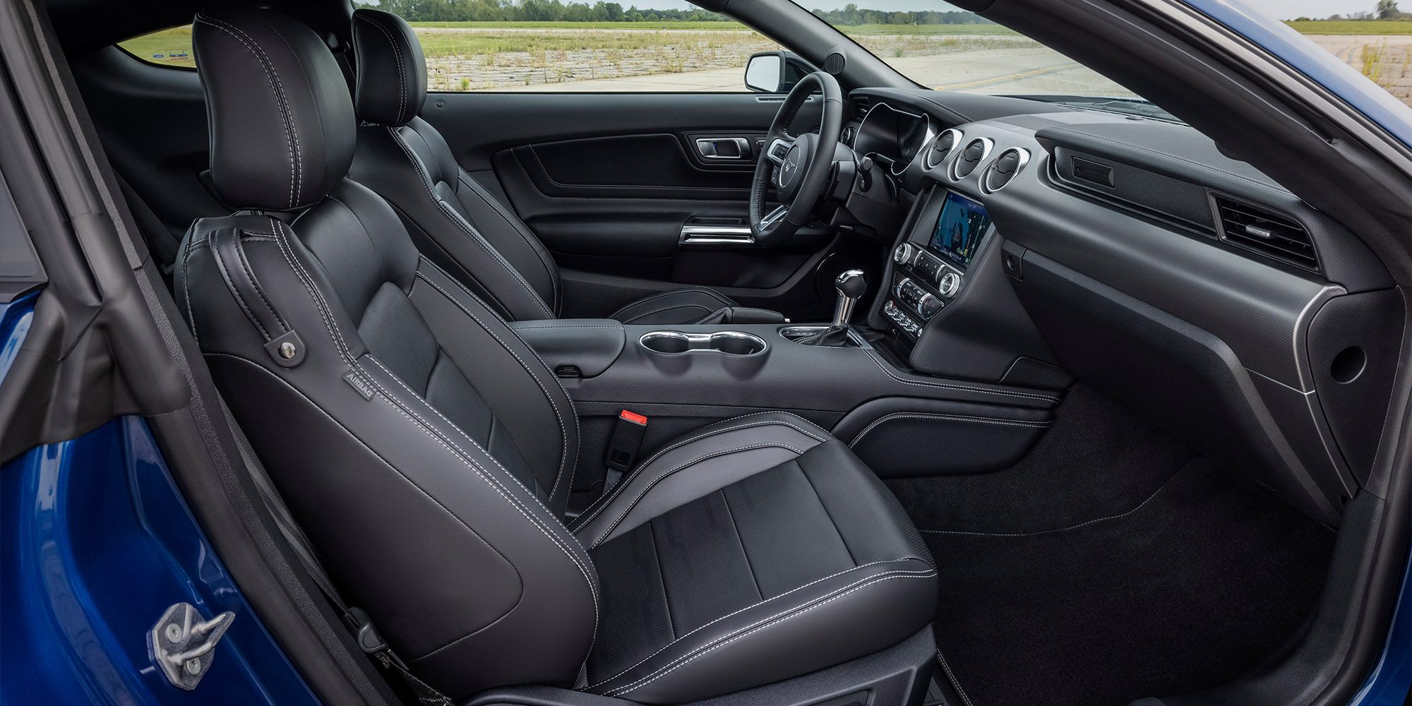 The interior of the 2022 Mustang GT, from the passenger side