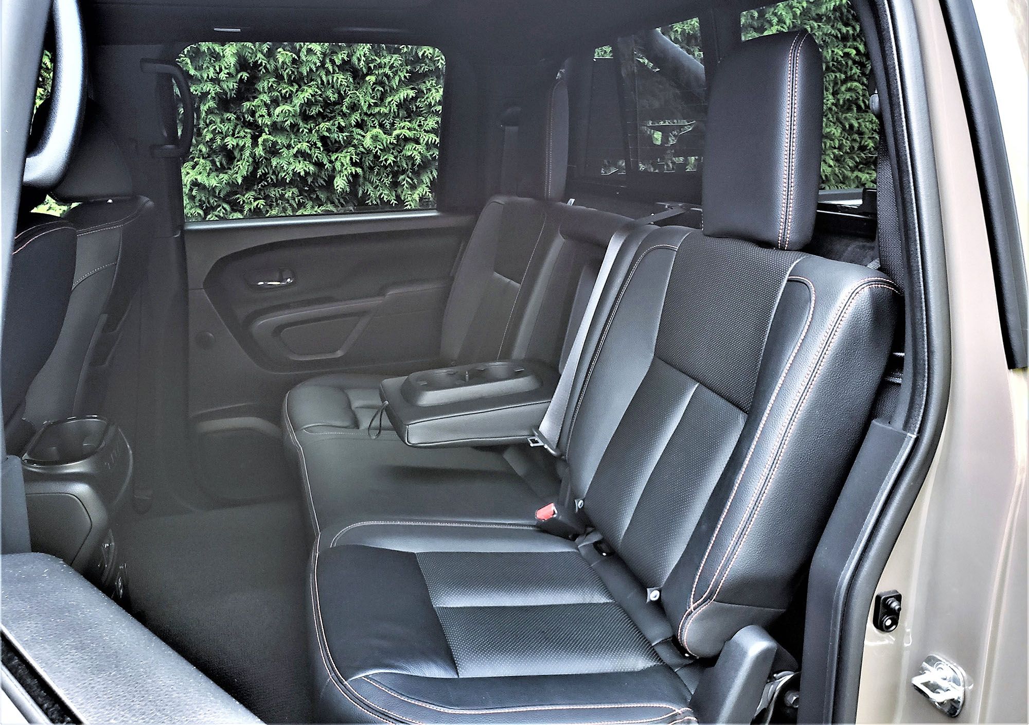 2022 Nissan Titan Crew Cab PRO 4X Luxury model's rear seat is roomy and comfortable.