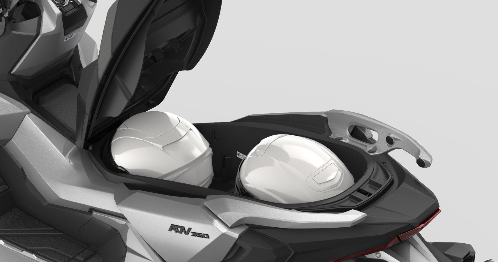 2022 Honda ADV350 fits 2 full-sized helmet in underseat storage