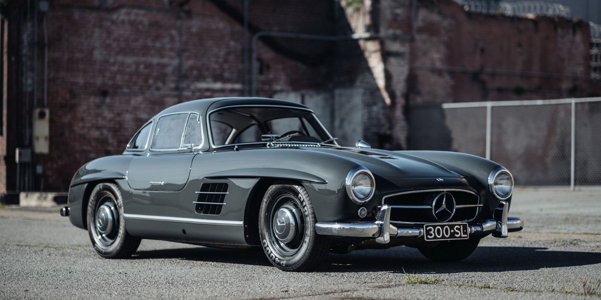 The Mercedes-Benz logo on a classic car