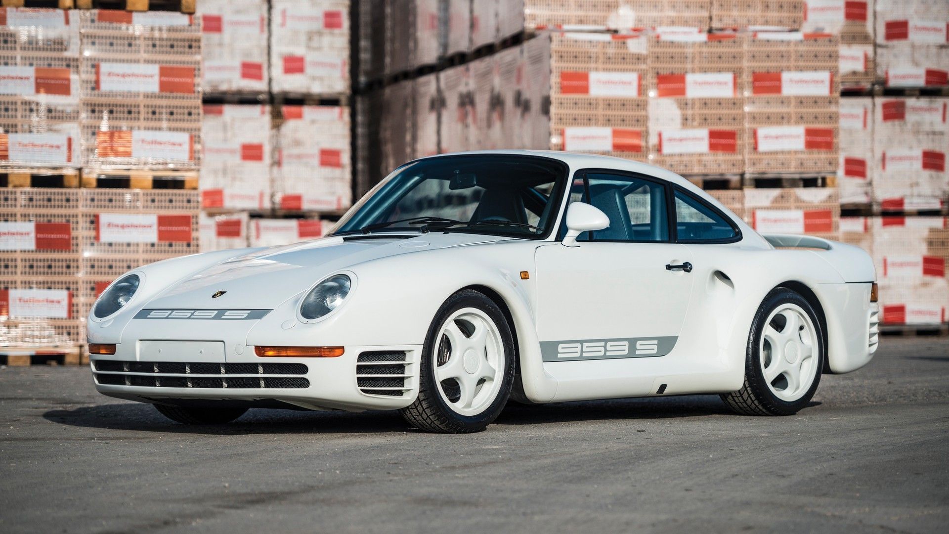 A White Porsche 959 Sports On The Street