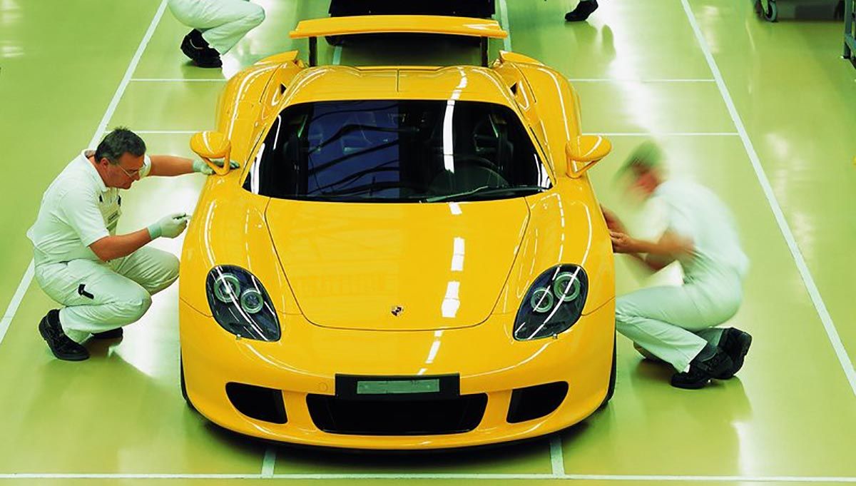 A Yellow 2004 Porsche Carrera GT Supercar Being Constructed
