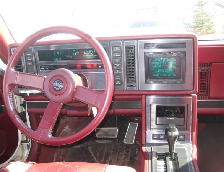 The interior of the buick reatta with its boxy center console