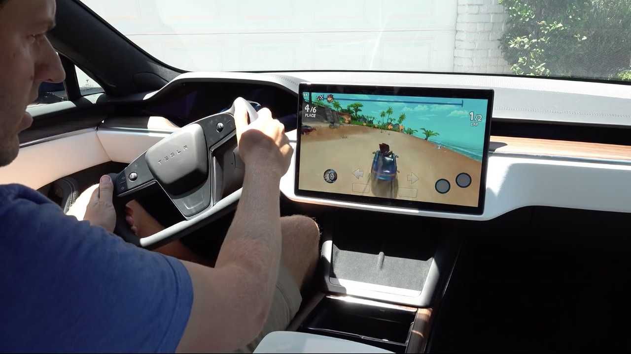 Doug Demuro Playing Driving Arcade Inside Tesla Model S Plaid