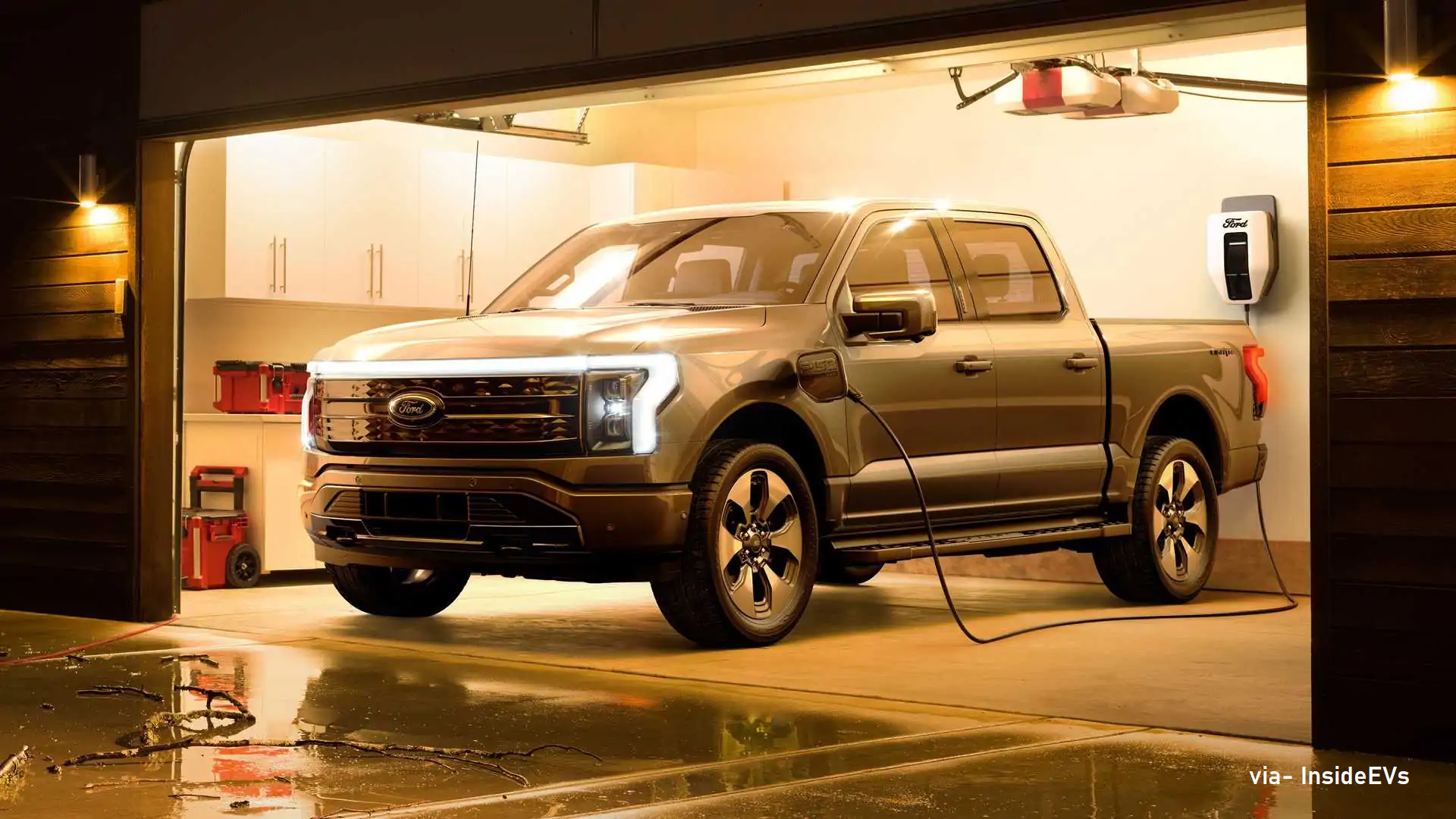 Ford's F-150 Lightning EV Truck being charged in night time