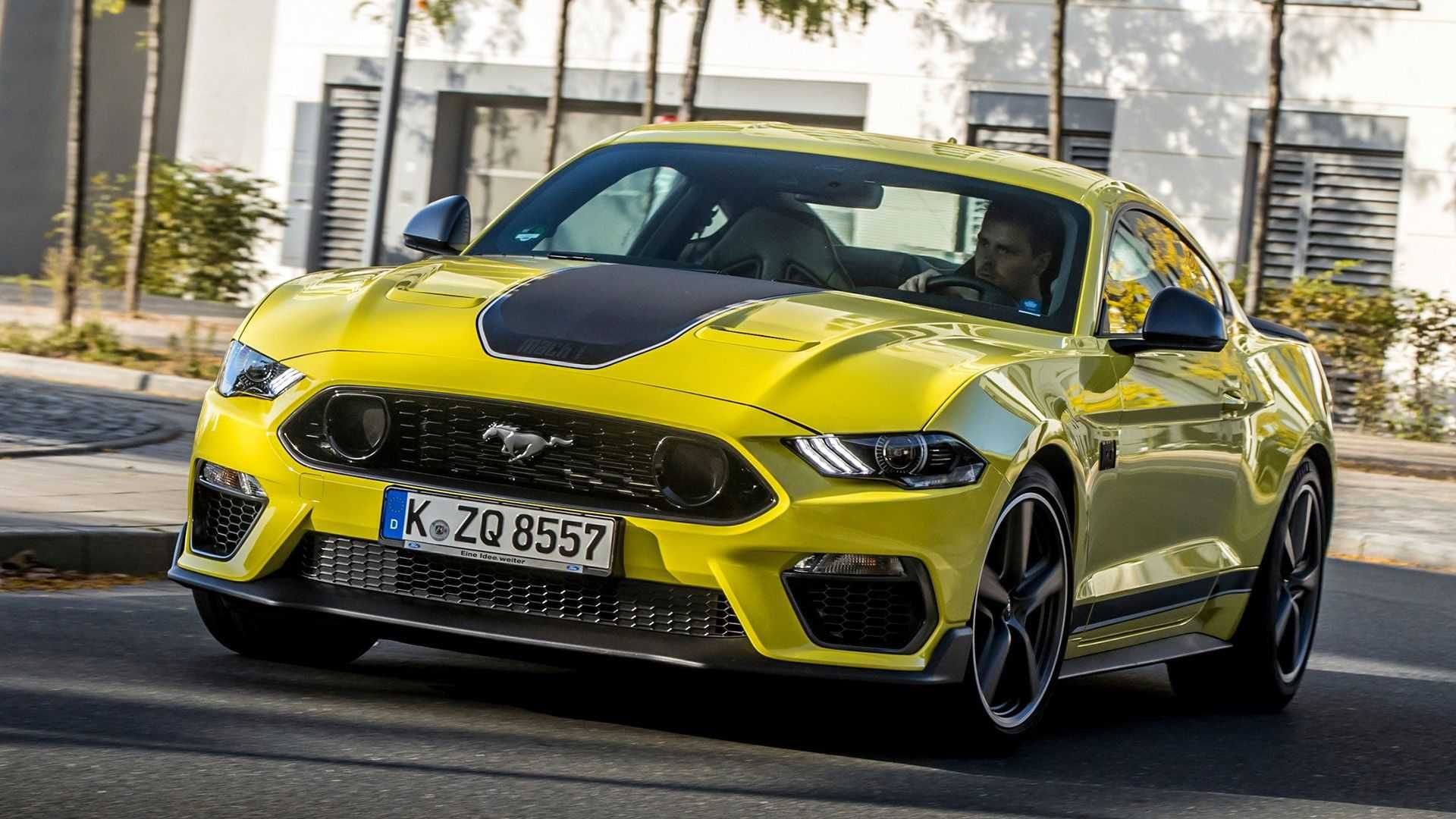 Yellow Ford Mustang with driver