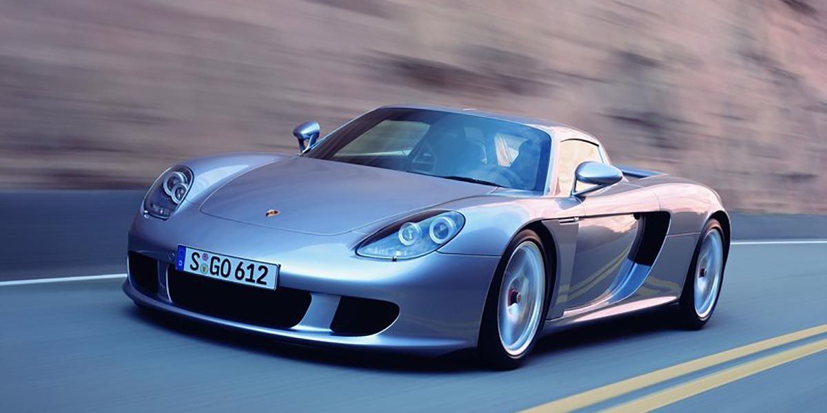 Front Of A Silver Porsche Carrera GT Supercar Driven On The Road
