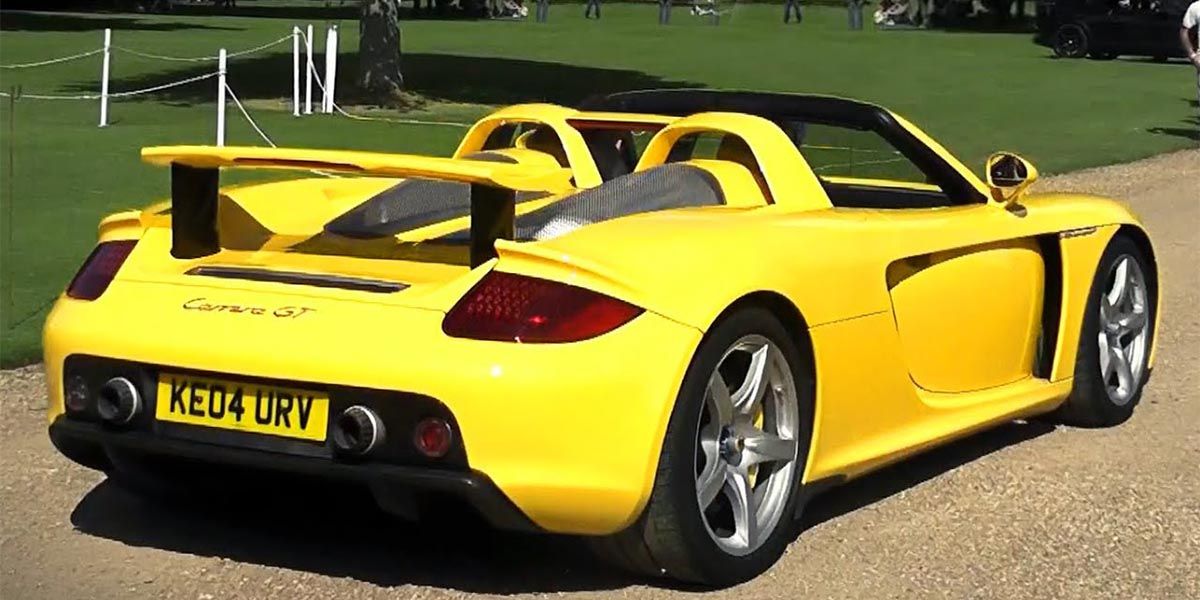 Yellow 2004 Porsche Carrera GT Supercar Rear