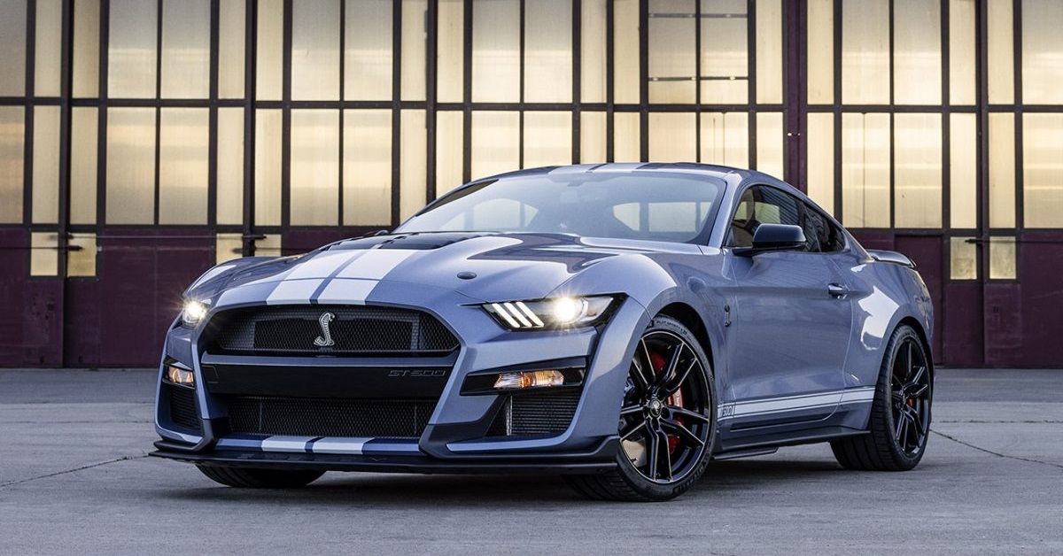 2022 Ford Mustang Shelby GT500, front and driver's side view with lights on
