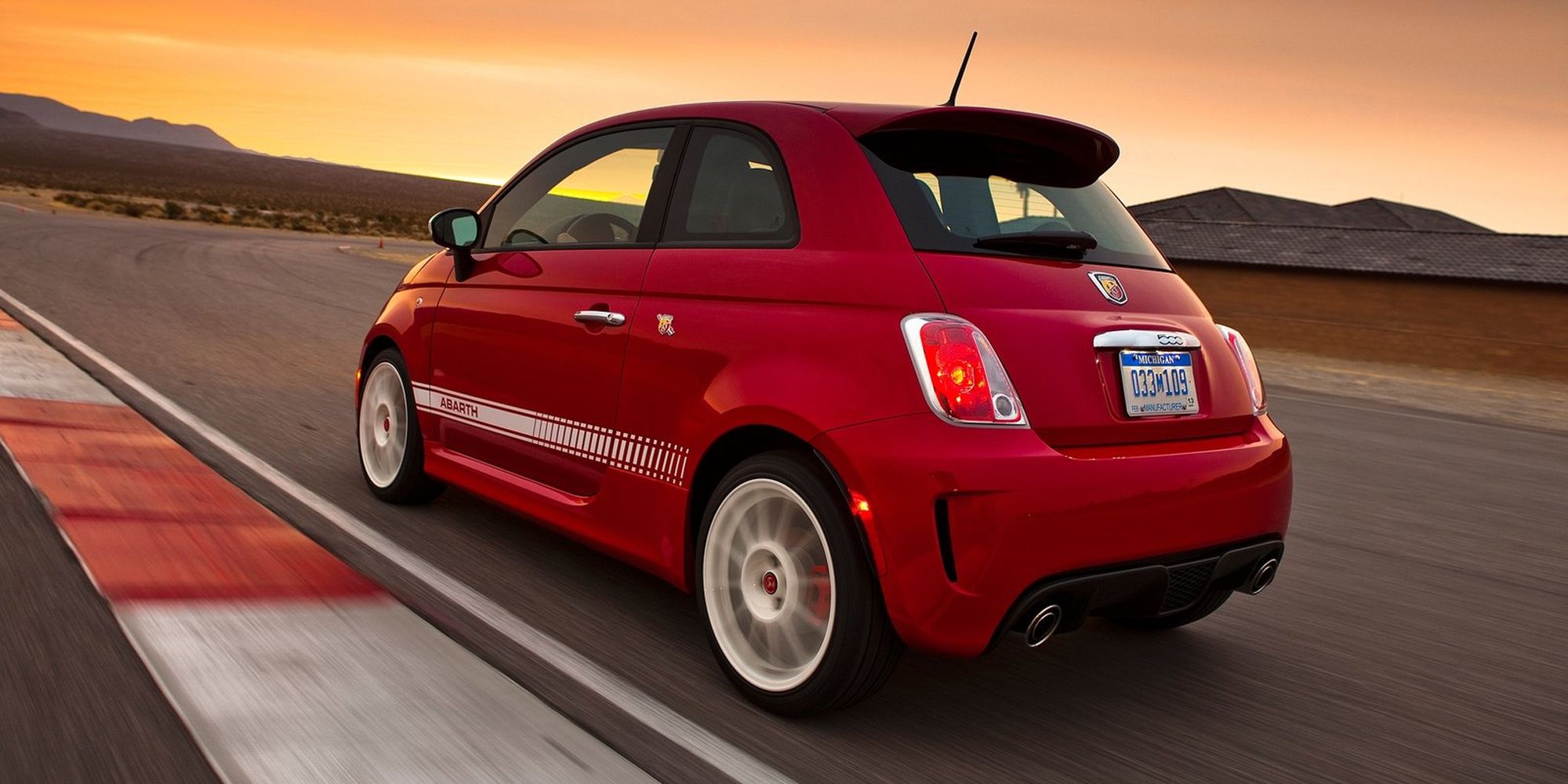 Rear 3/4 view of the Abarth 500 in red