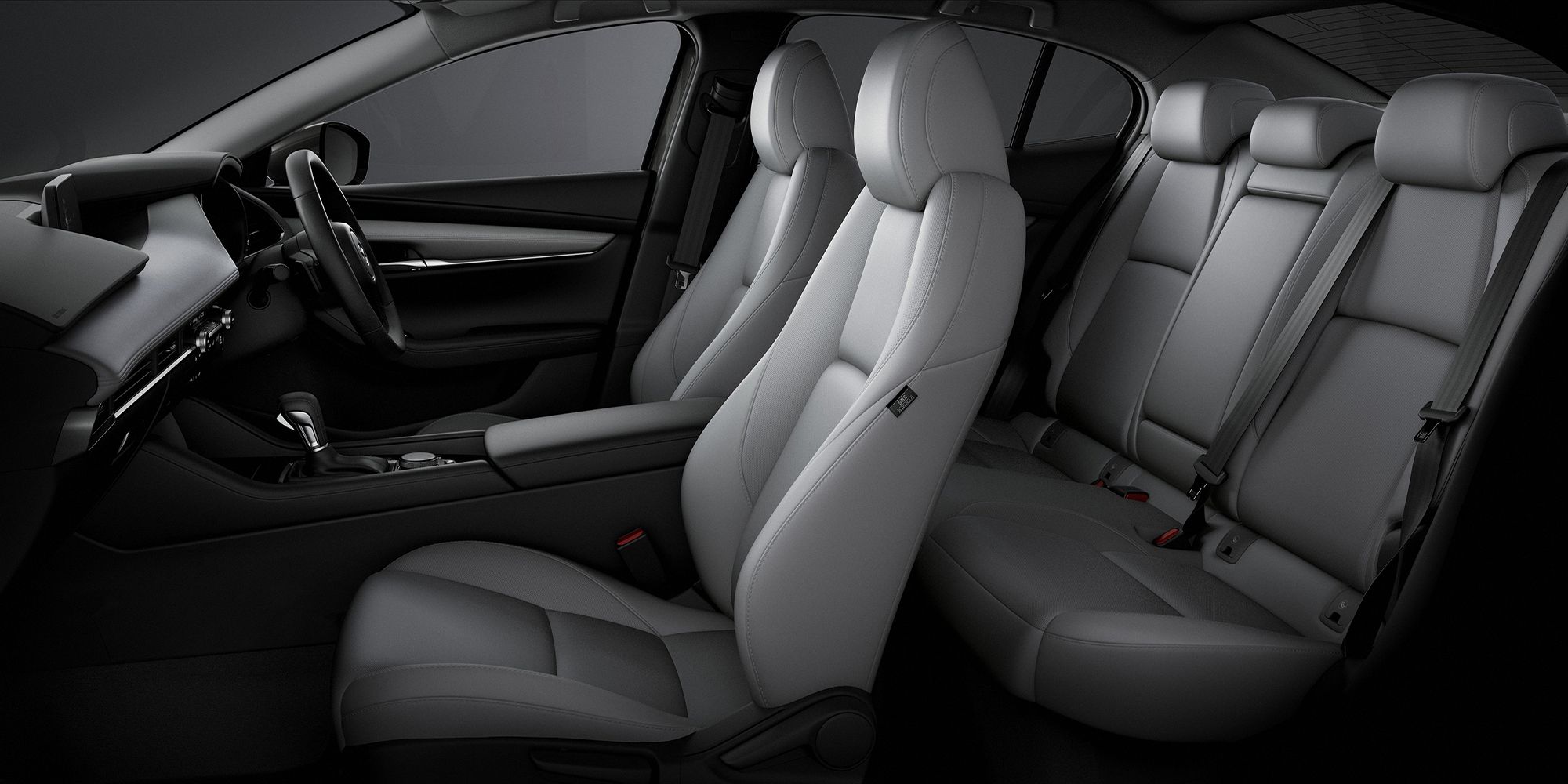 The interior of the Mazda 3, front and rear seats