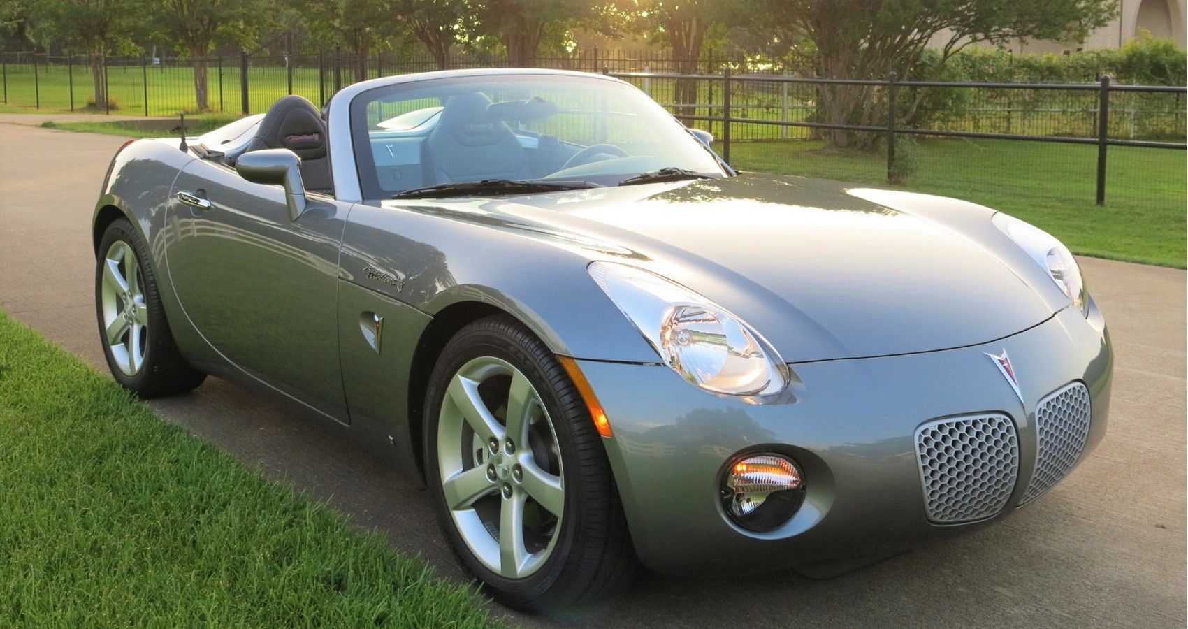 silver Pontiac Solstice from the front right side 