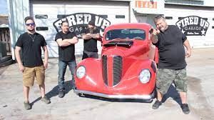 Misfit Garage Crew with a Classic Car