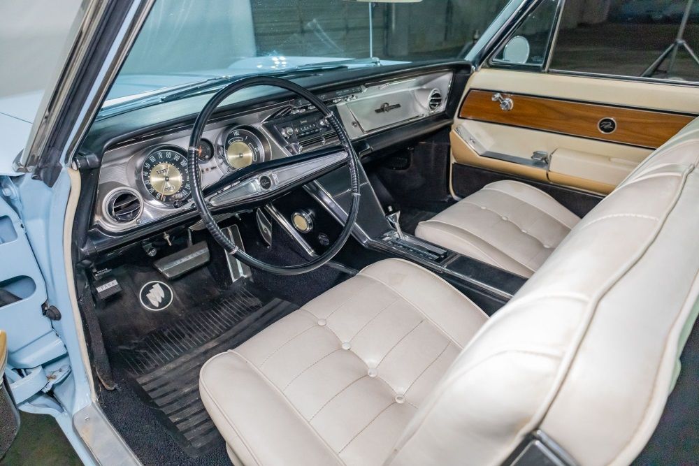 Auction Dilemma: Buick Riviera Vs. Ford Thunderbird