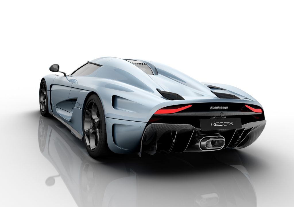 Light blue 2020 Koenigsegg Regera on the showroom floor showing exhaust, exterior carbon fiber panels, hood, roof panel, and air intakes