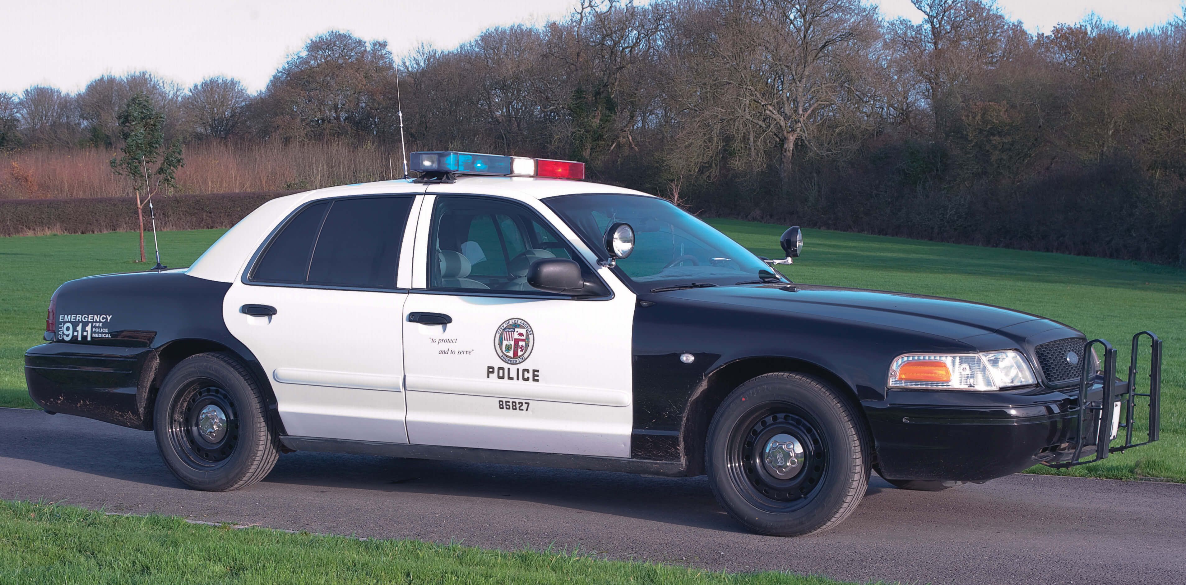 1999 Ford Crown Victoria police car, front quarter view, outside