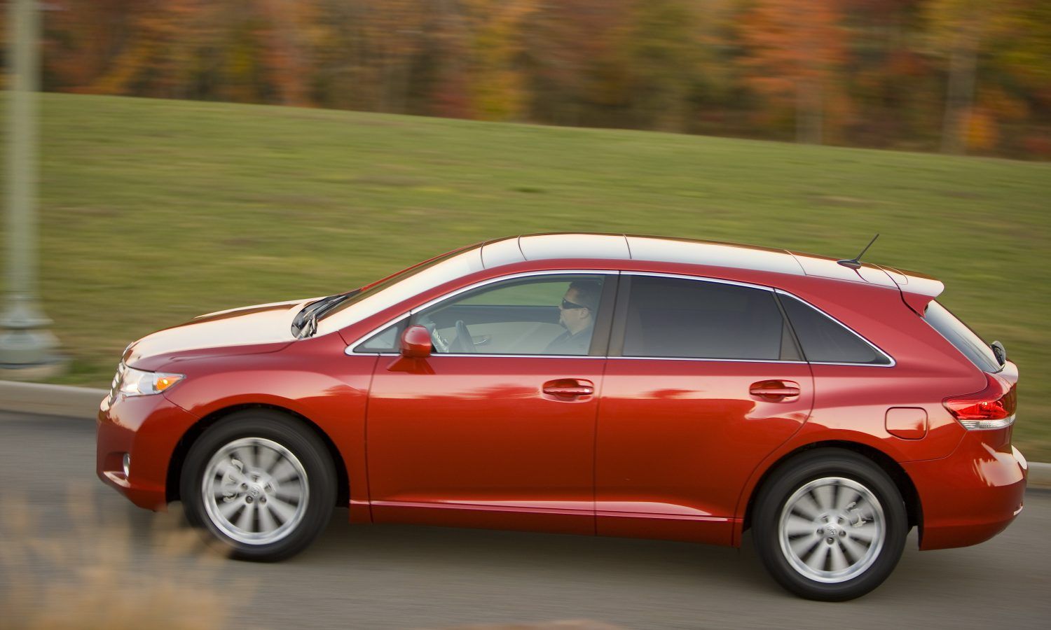 Red 2009-2012 Toyota Venza on the road