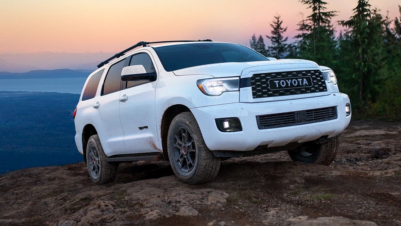 A White 2023 Toyota Sequoia On A Hill