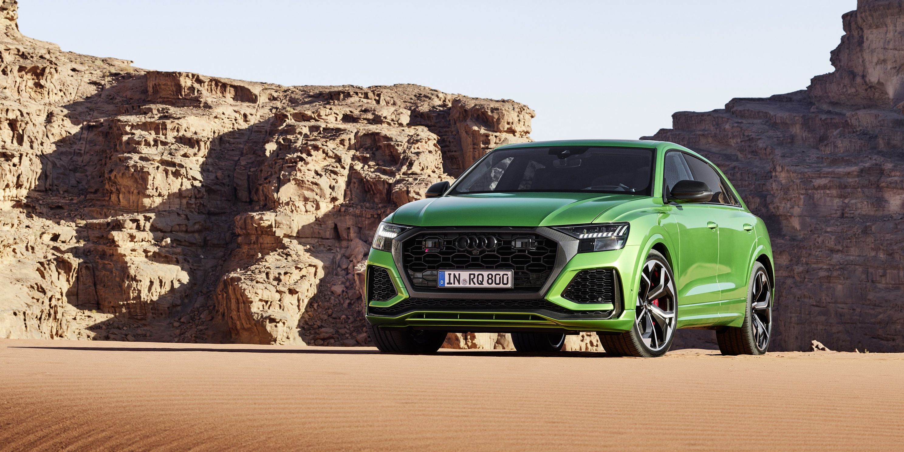 Audi RSQ8 green on sand dunes