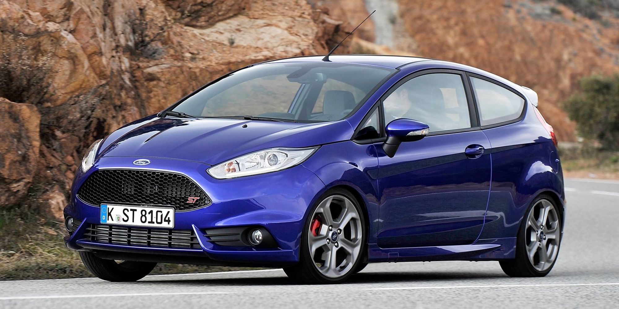 Front 3/4 view of a blue Fiesta ST on the move