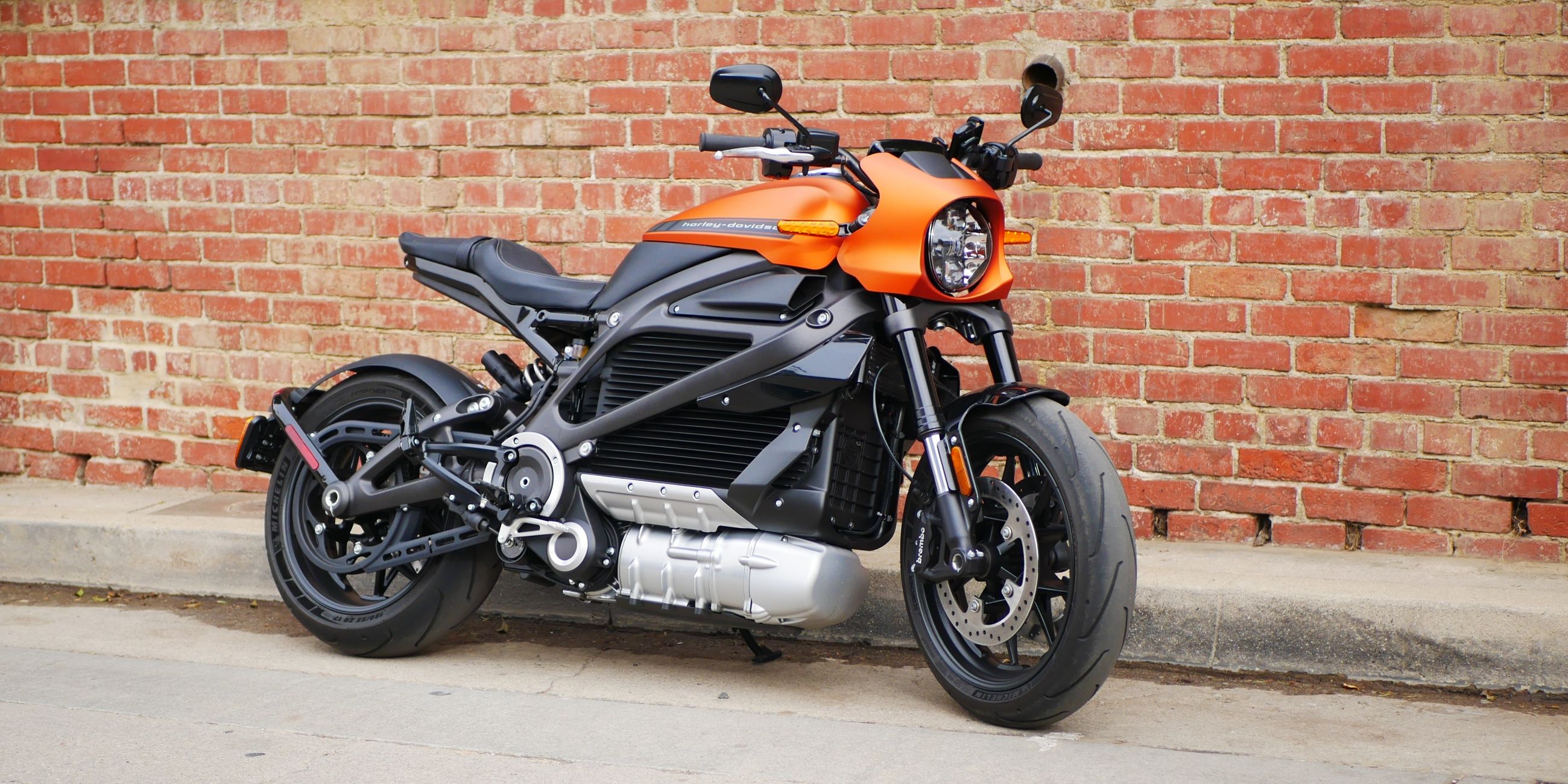 Harley-Davidson Livewire parked by brick wall