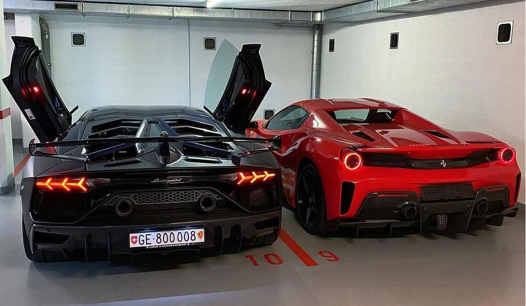 Lamborghini vs Ferrari in garage
