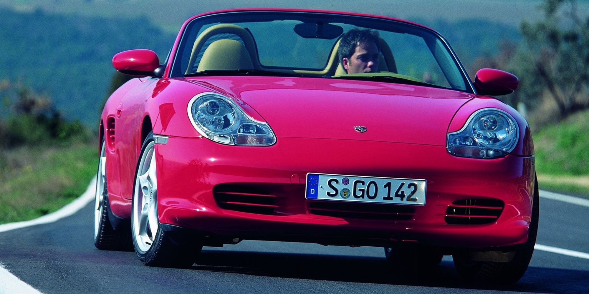 The front of a red Boxster S, top down