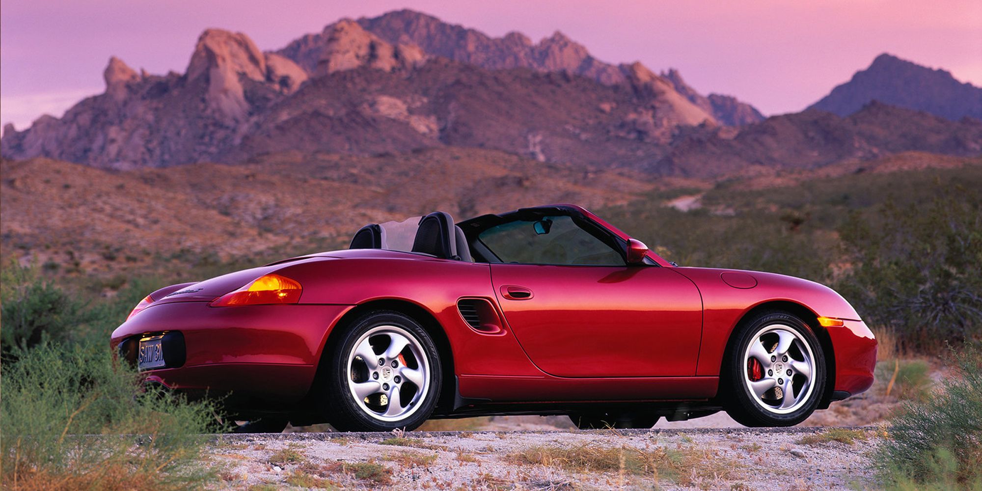 Side view of a red Boxster S