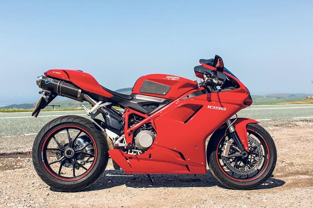 The Side View Of A Red The Ducati 1098