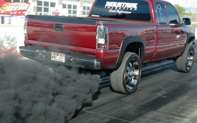 Truck with rolling coal