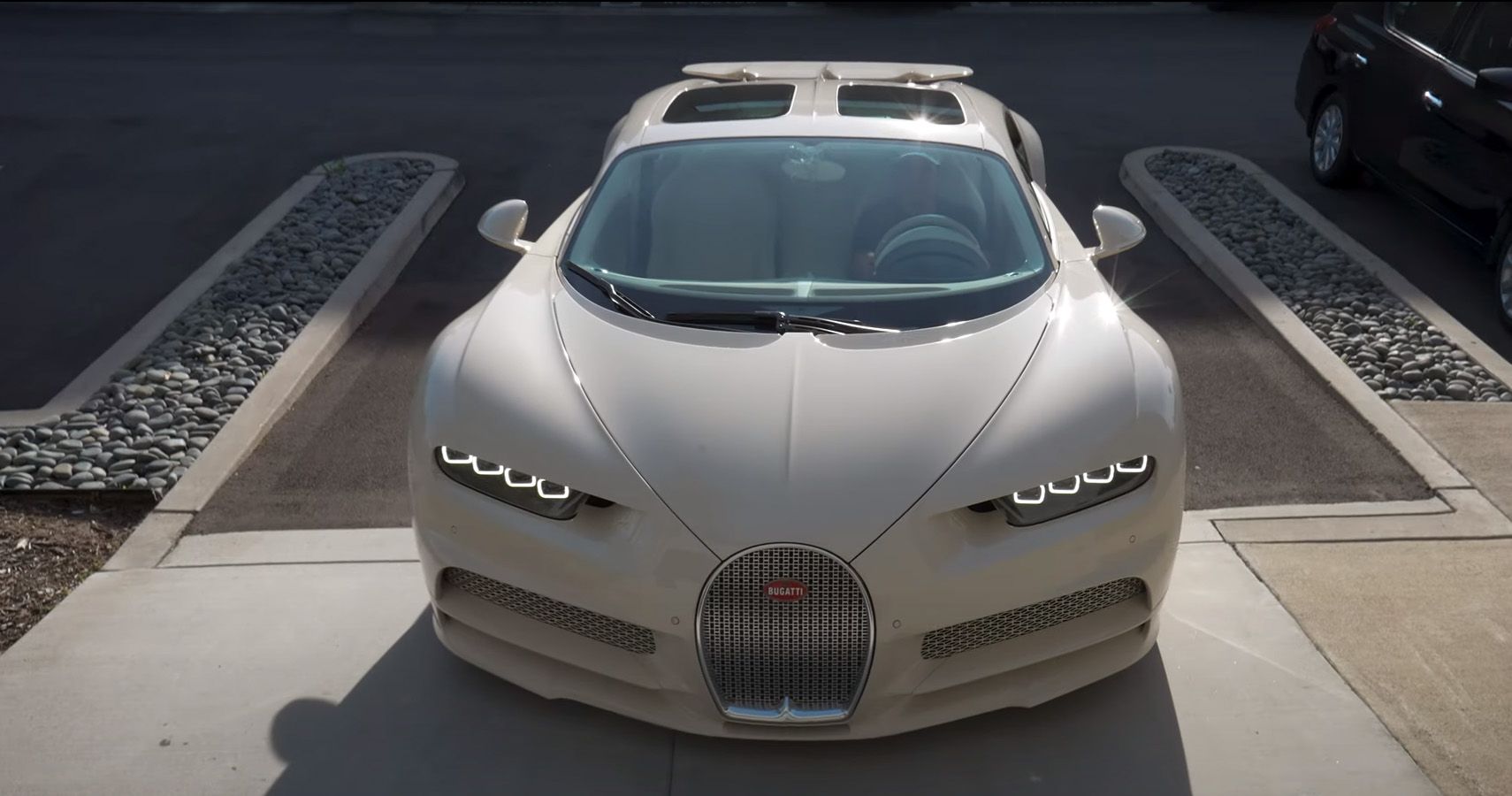 White 2020 Hermes edition Bugatti Chron in parking lot